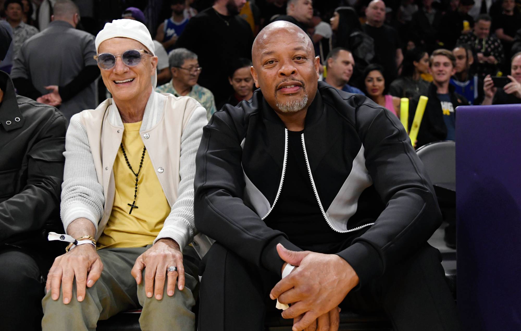 Dr. Dre and Jimmy Iovine attend a basketball game between Los Angeles Lakers and Memphis Grizzlies Round 1 Game 6 of the 2023 NBA Playoffs against Los Angeles Lakers at Crypto.com Arena on April 28, 2023 in Los Angeles, California. (Photo by Kevork Djansezian/Getty Images)