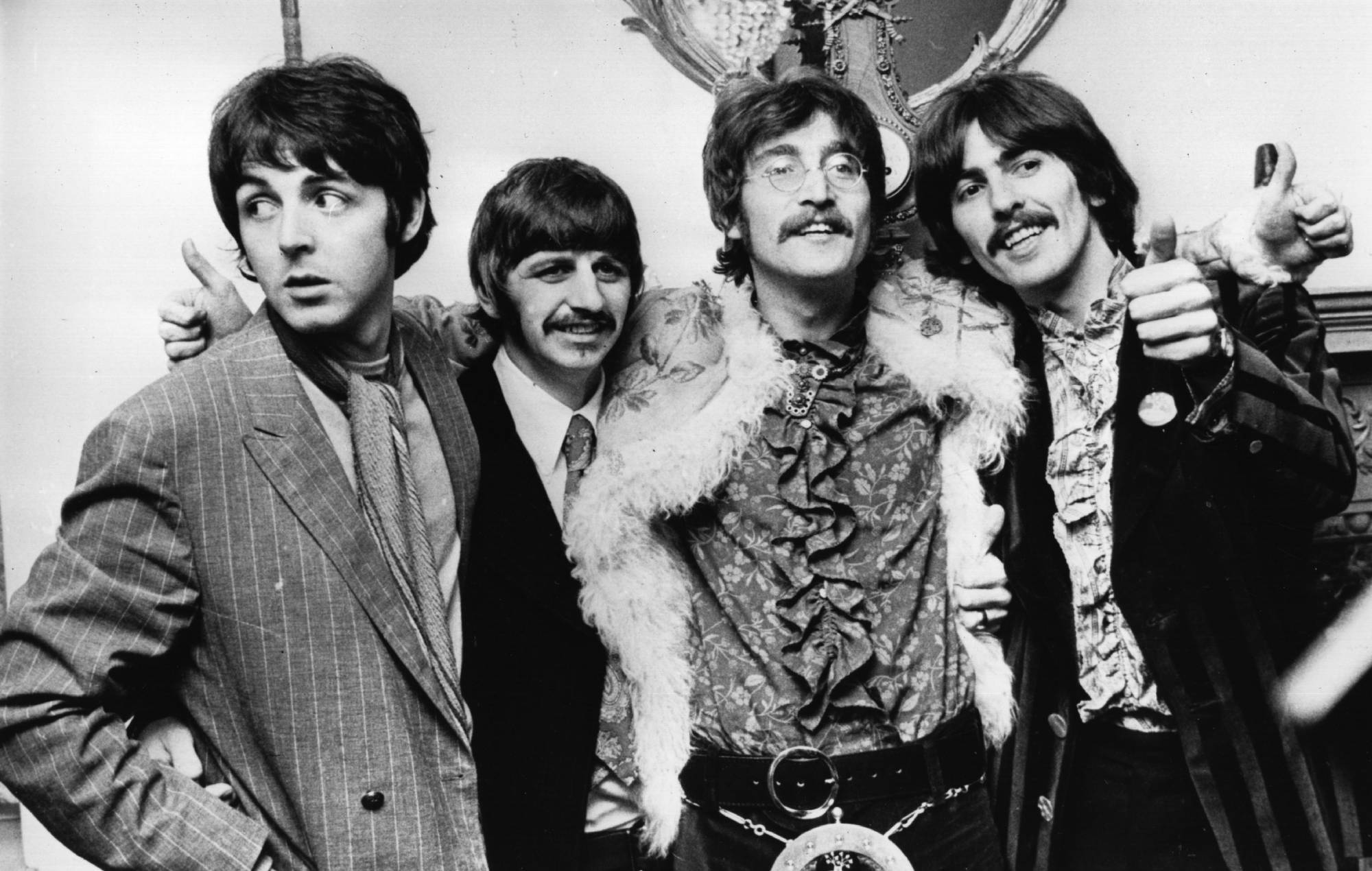 The Beatles celebrate the completion of their new album, 'Sgt Pepper's Lonely Hearts Club Band', at a press conference held at the west London home of their manager Brian Epstein. The LP is released on June 1st. (Photo by John Pratt/Keystone/Getty Images)