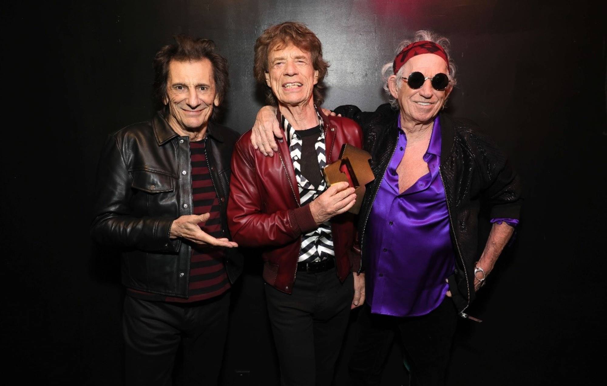 The Rolling Stones celebrate their Official Number 1 album with Hackney Diamonds in October 2023. Credit: Official Charts