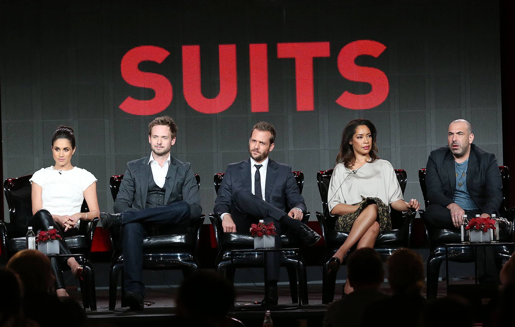 (L-R) Executive producer Aaron Korsh, actress Meghan Markle, actor Patrick J. Adams, actor Gabriel Macht, actress Gina Torres, actor Rick Hoffman, and actress Sarah Rafferty