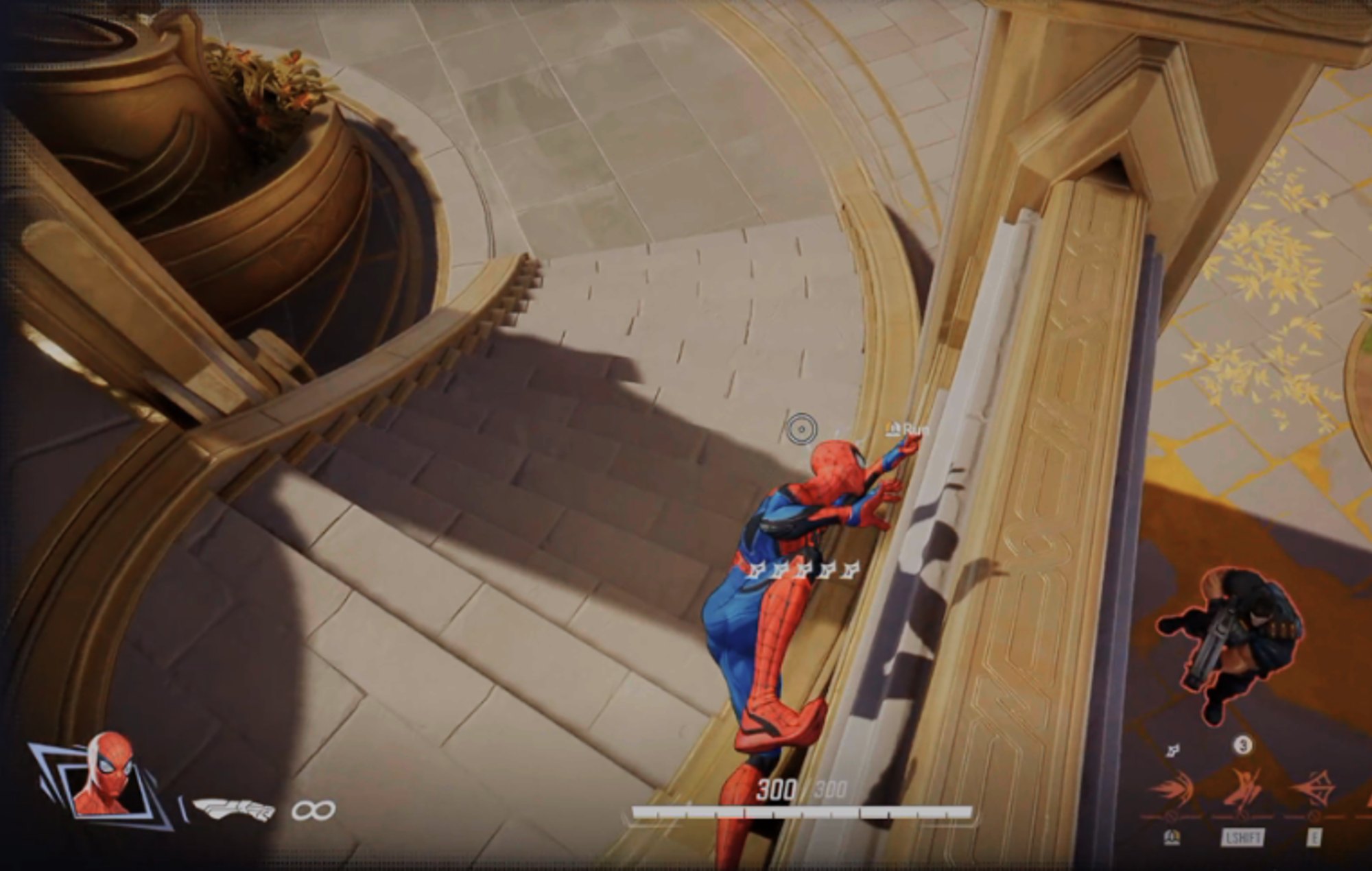 Marvel Rivals Characters: Spider-Man can be seen crawling on a wall, alterted to an enemy.