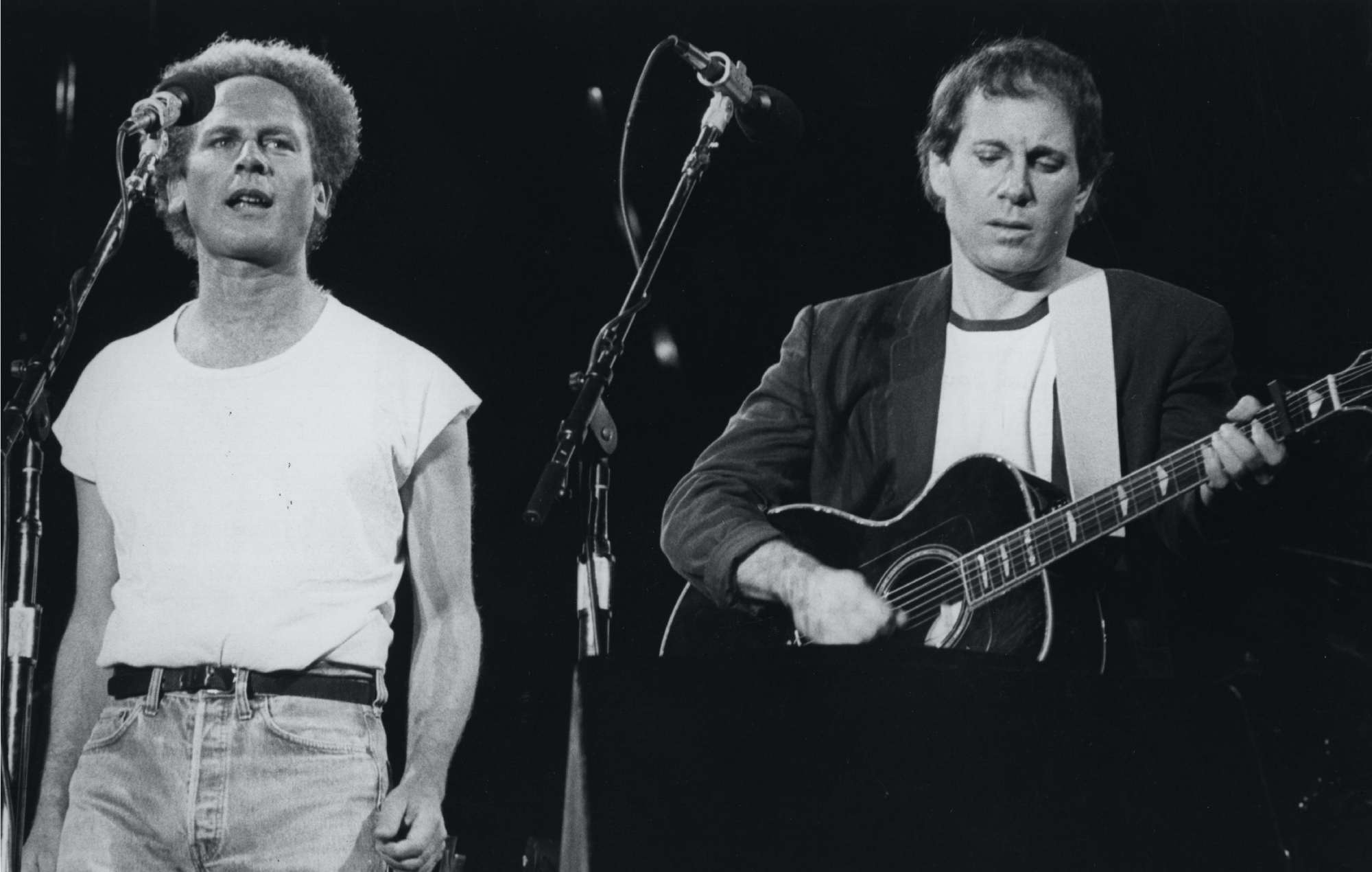 967: Folk pop duo Art Garfunkel and Paul Simon, playing in front of more than 50,000 people in Madrid, at the start of their European tourCentral Press/Getty Images